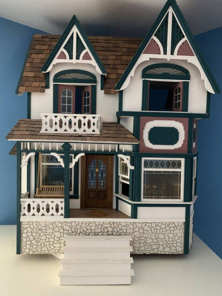 A few years after our oldest daughter was born, my father-in-law built her a beautiful, custom-designed, wooden dollhouse