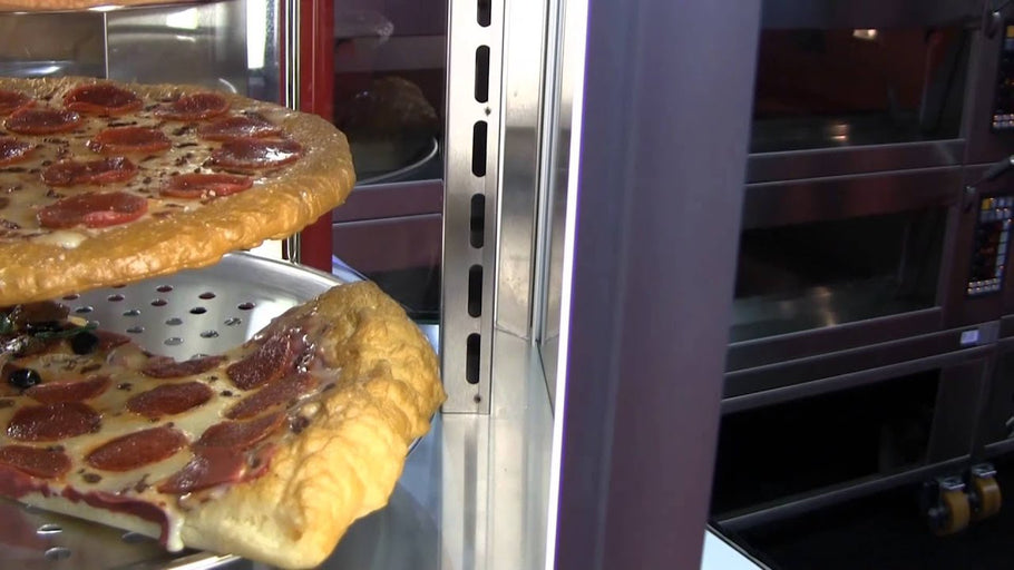 This Hatco display cabinet features both heat and humidity, providing a merchandising environment for a variety of products