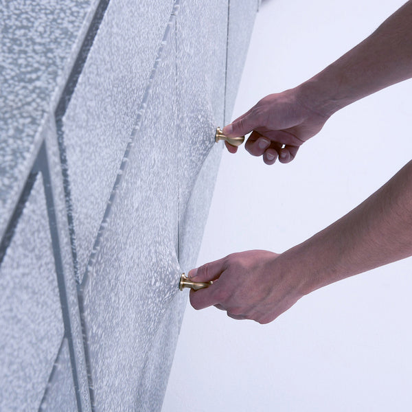 Masque Thing cabinet features stretchy doors and "sumptuous" legs