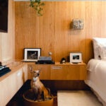 A Floating, L-Shaped Cabinet Pulls Double Duty in This São Paulo Bedroom